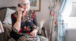 senior woman on phone at their home