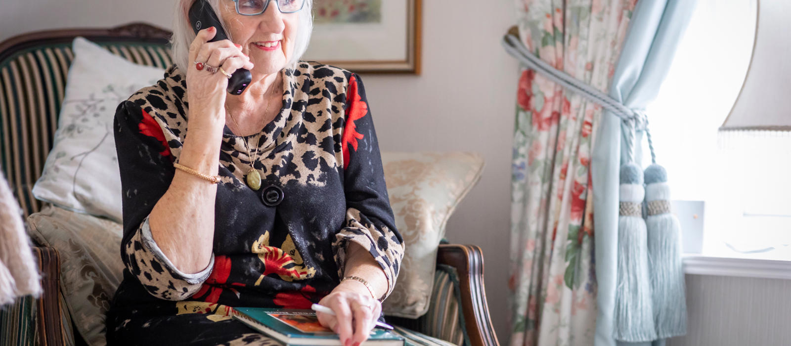 senior woman on phone at their home