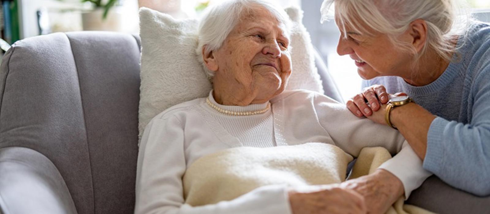 Two ladies talking to each other